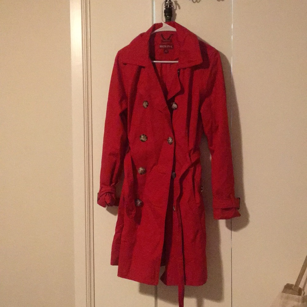 Red knee length water resistant trench coat